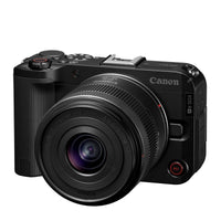 Cámara profesional Canon R50 V negra con lente RF-S 14-30mm, vista frontal sobre fondo blanco.