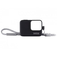 Funda de silicona negra GoPro con correa ajustable gris para transportar y proteger cámaras compatibles.