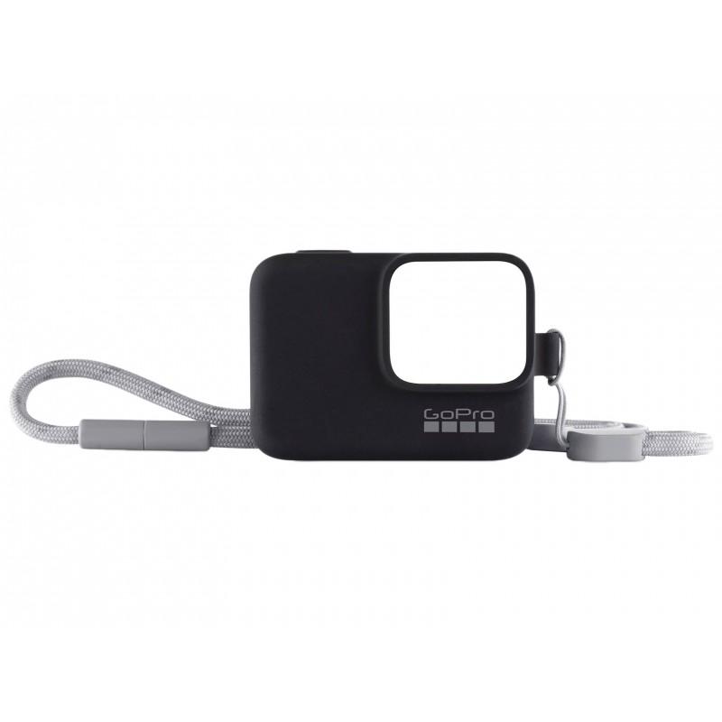 Funda de silicona negra GoPro con correa ajustable gris para transportar y proteger cámaras compatibles.